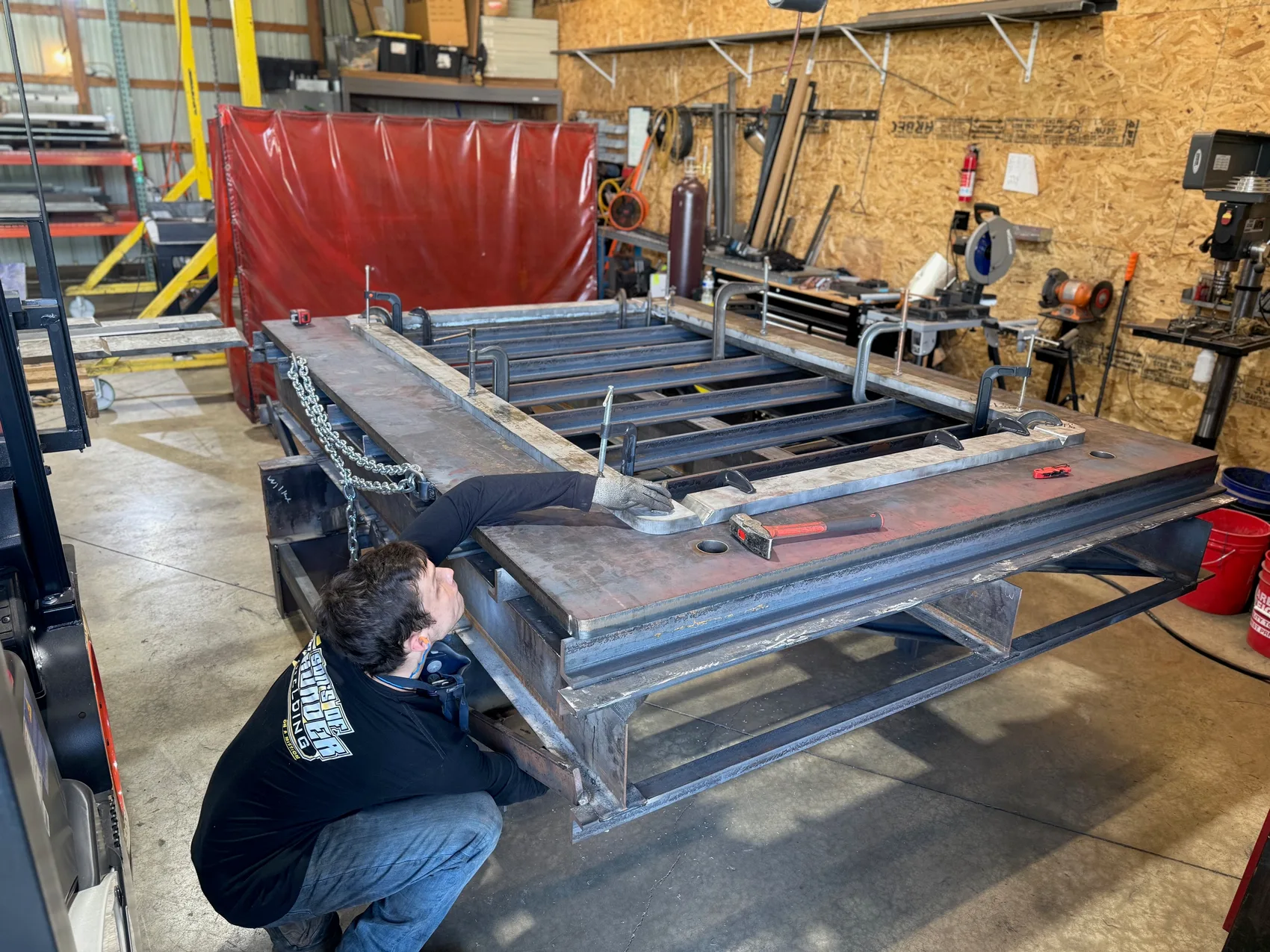 Fitting up a heavy door frame on the floor - studs and ribs set before the channels get welded closed.