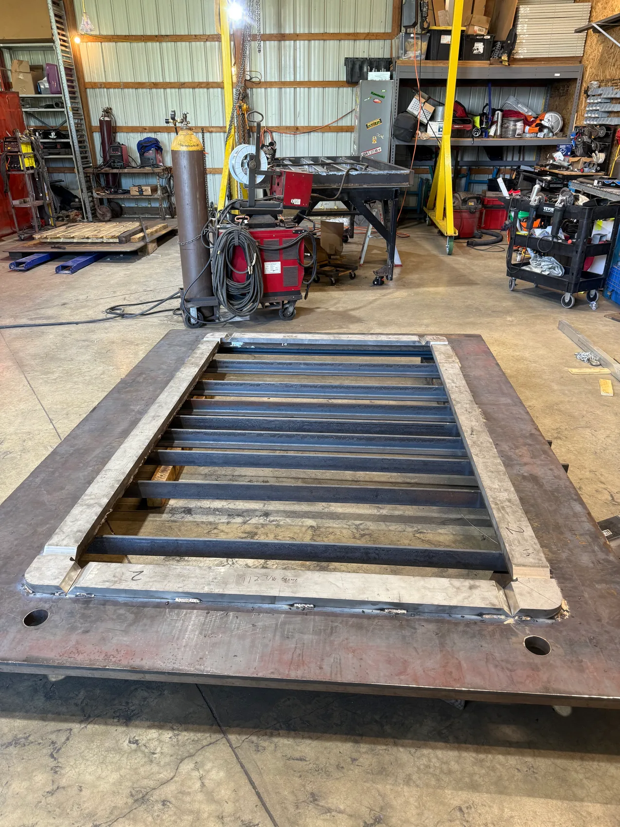 Ribbed steel door frame fabrication on the table
