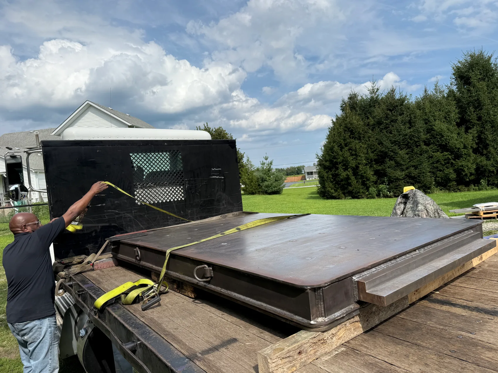 Custom steel truck-bed weldment loaded out