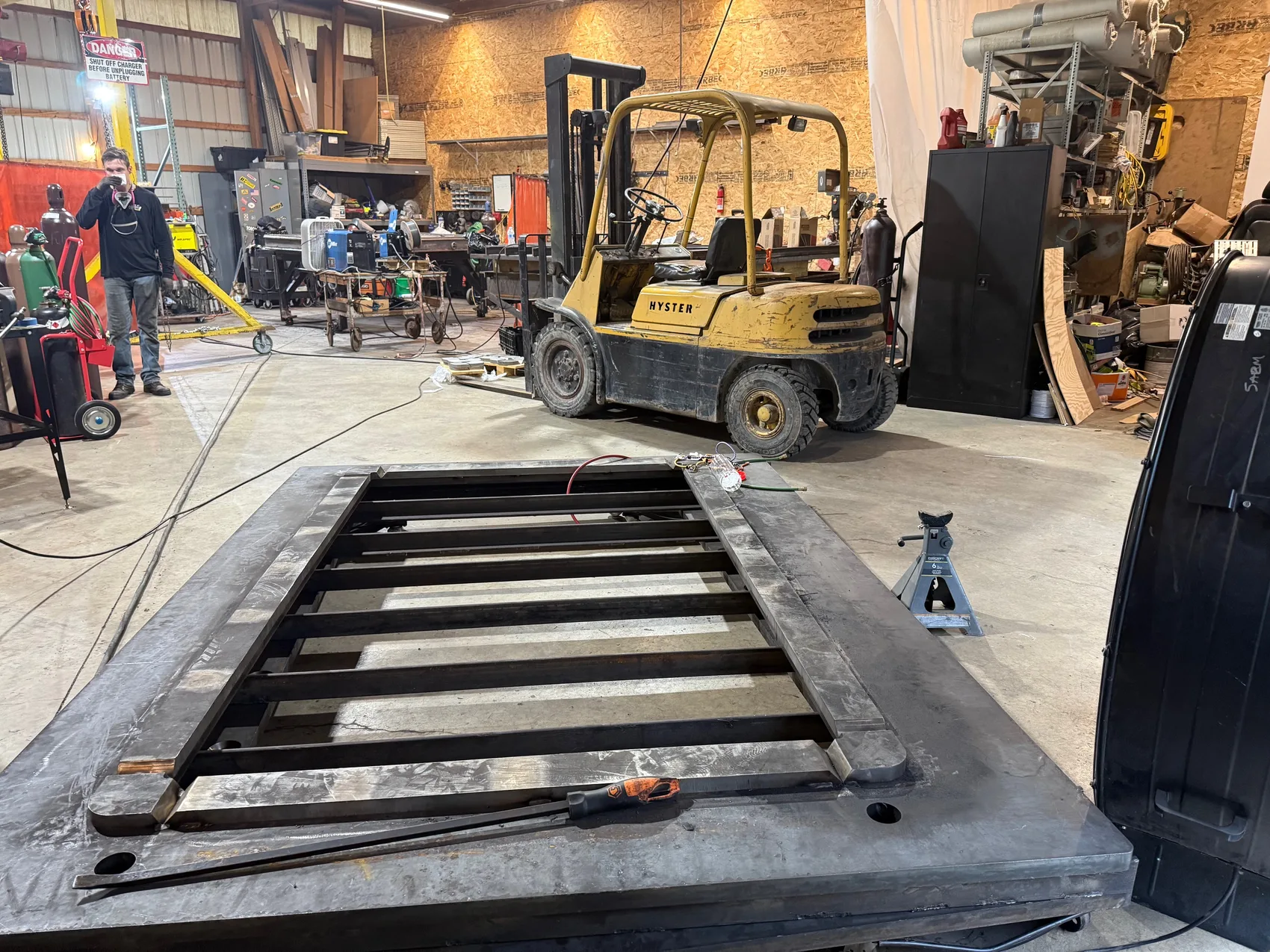 Door frame weldment beside the shop forklift