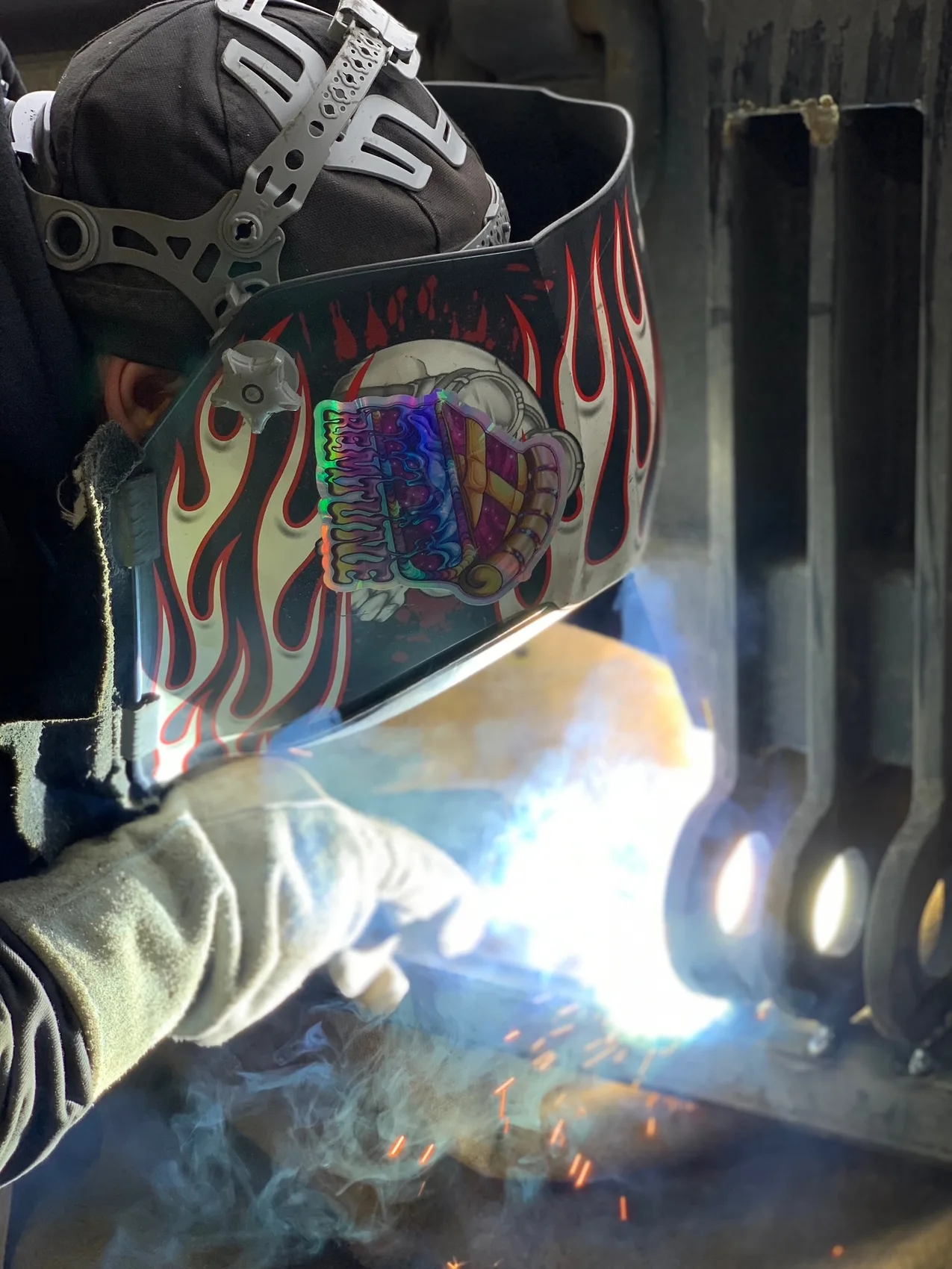 Bright arc behind the hood