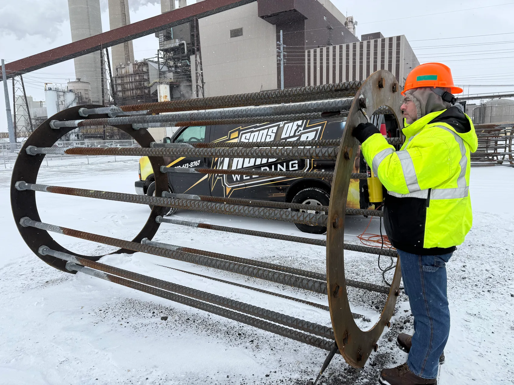 Rebar cage assembly at a snowy power plant