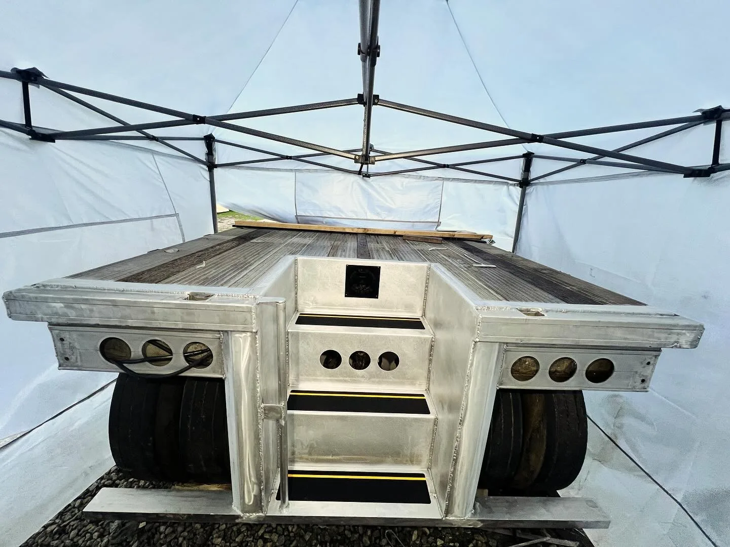 Custom-fabricated aluminum trailer bed and rear cross-member built by Sons of Thunder Welding